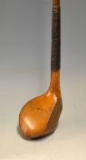 Fine A Bell elegant drop toed golden fruit wood driver – with good period hide replacement grip.