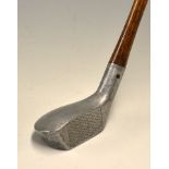 An unusual unnamed small mallet style alloy driver with short stout bore thro’ hosel - diamond