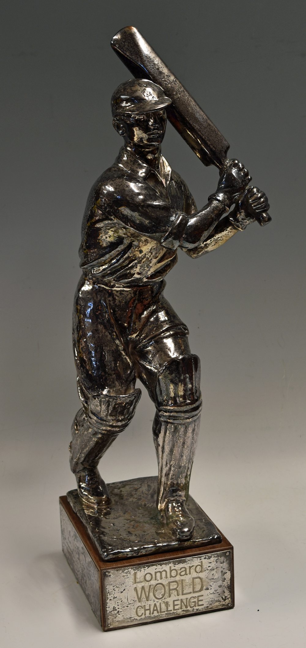 Lombard World Challenge Cricket Trophy U15’s Trophy - a large white metal Cricket Figure in