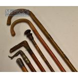 Varied Selection of Walking Sticks to include a female leg handled stick in white metal, another