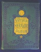 The Victoria Heraldic Album with many pages completed with heraldic cuttings generally laid down.