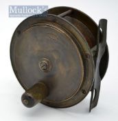 A Carter & Co Ltd London Hercules style brass salmon reel: 4”dia, smooth waisted and perforated