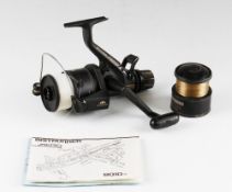 Shimano 6010 Fishing Reel: Baitrunner Aero 5 – 8 with spare spool, instruction booklets c/w line