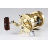 Shimano Calcutta 700 sea multiplier reel, gold anodised finish, power crank handle with star drag,