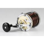 Mitchell Garcia 624 sea multiplier reel, Chrome and cream, power crank handle with star drag,