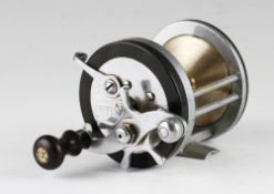 Pflueger The Capitol saltwater reel, wood handle, ratchet and brake controls No 1988