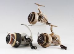 Collection of Young & Sons and Allcocks casting reel (3): 2 The Ambidextrous gold finish one with