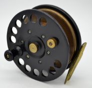 “Facile” ebonite and brass star back centre pin reel – 4.5” dia – single row of 12 perforations to