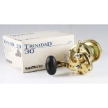 Shimano Trinidad 30 gold finish multiplier reel, Power handle and oversized soft touch knob, star
