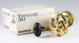 Shimano Trinidad 30 gold finish multiplier reel, Power handle and oversized soft touch knob, star