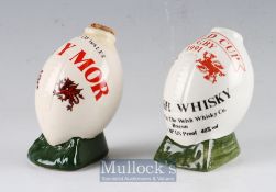 Two small empty Welsh Swn-y-Mor white ceramic Whisky Bottles in Rugby Ball shape, one for the
