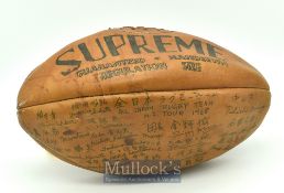 Japan’s first rugby tour of New Zealand 1968, signed ball plus associated photo: Partly-deflated