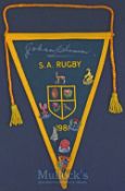 1981 SA Rugby pennant signed by Springbok Johann Claassen: Large triangular green and gold felt