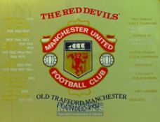 Manchester United Football Mirrors both with Emblem and various details surrounding, both framed,