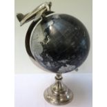 TERRESTRIAL DESK GLOBE mounted on a chrome stand with a propeller plane finial, 38cm high