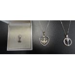THREE SILVER COMMUNION JEWELLERY ITEMS comprising two pendants, one with a dove suspended within a