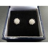 PAIR OF DIAMOND CLUSTER STUD EARRINGS in nine carat gold