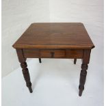 EDWARDIAN OAK TEA TABLE the square top with canted corners, single drawer and raised on long