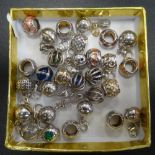 LARGE SELECTION OF SILVER BALL CHARMS of various designs including enamel decorated and cage