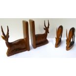 PAIR OF CARVED AFRICAN HARDWOOD BOOKENDS in the form of recumbent Impala, together with a pair of