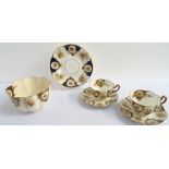 WILLIAM LOWE TEA SERVICE with floral and gilt decoration, comprising twelve cups, saucers and side