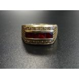 RUBY AND DIAMOND DRESS RING the square cut rubies with a row of diamonds above and below, in