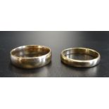 TWO NINE CARAT GOLD WEDDING BANDS ring sizes V-W and X, total weight approximately 8.3 grams