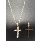 CZ SET NINE CARAT GOLD CROSS PENDANT on nine carat gold chain; together with another nine carat gold