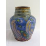 ROYAL DOULTON OVOID VASE with a ring turned neck, the body decorated with stylised floral motifs