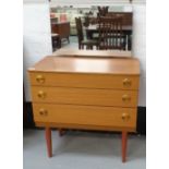 SCHRIEBER TEAK DRESSING CHEST the raised mirror back above three drawers with circular shaped