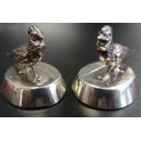 PAIR OF SILVER SAMPSON MORDAN PLACE HOLDERS decorated with pheasants, Chester hallmarks for 1913,