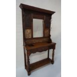 LATE VICTORIAN OAK HALLSTAND with shaped cornice over a central mirror, flanked by carved and marble