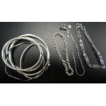 SELECTION OF EIGHT SILVER BANGLES AND BRACELETS including a Machintosh style bracelet and a wavy