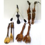 SELECTION OF AFRICAN CARVED HARDWOOD ORNAMENTS including an ebonised Kenyan rocking warrior desk