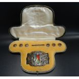 ART NOUVEAU LIBERTY & CO. ENAMEL DECORATED SILVER BUCKLE of pierced and shaped design, hallmarks for