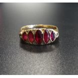 GRADUATED RUBY FIVE STONE RING the marquise rubies interspersed with small diamonds, on eighteen