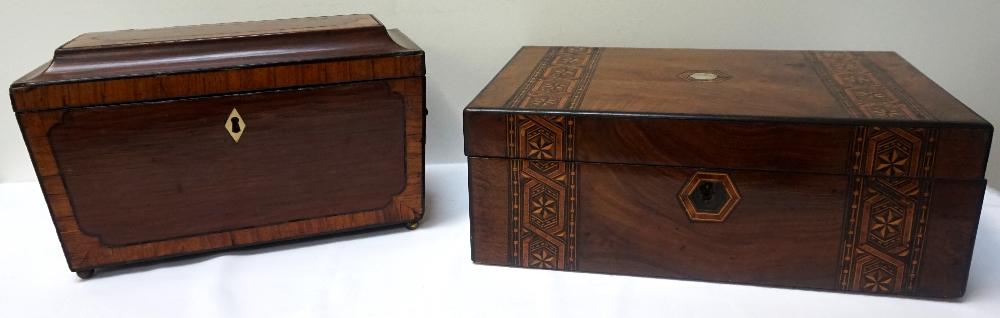 19th CENTURY MAHOGANY AND WALNUT SARCOPHAGUS SHAPED TEA CADDY with lion mask and hoop handles,