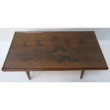 MALYASIAN TEAK OCCASIONAL TABLE with a rectangular carved top depicting a fisherman by a house