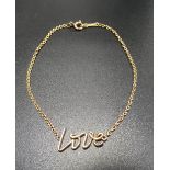 TIFFANY & CO. PALOMA PICASSO EIGHTEEN CARAT GOLD LOVE BRACELET 18cm long