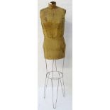 1950'S ADJUSTABLE CARD MANNEQUIN on a metal frame and marked to the body 'Perfect Fit Form-O-Matic