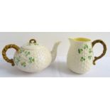 'BELLEEK' PORCELAIN TEAPOT with shamrock and basket weave decoration, bearing third black mark to