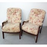 PAIR OF ARMCHAIRS with mahogany frames and button backs with stuffover seats and padded arms,