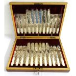 MAHOGANY CASED SET OF FISH CUTLERY comprising twelve fish knives and forks with mother of pearl