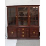 LARGE CHINESE TEAK BOOKCASE the upper section with three glazed doors and shelved interior, above