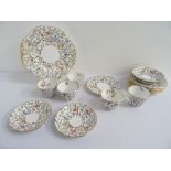 SPODE COPELAND TEA SET with colourful floral and inset decoration, comprising five tea cups, four