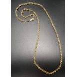 EIGHTEEN CARAT GOLD ROPE TWIST NECK CHAIN 63cm long and approximately 14.7 grams