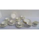 MINTON ALPINE SPRING PATTERN COFFEE SERVICE comprising six cups, saucers and side plates, a milk jug