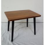 1960'S WALNUT LOW OCCASIONAL TABLE the oblong top with rounded corners standing on ebonised