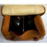 SET OF EBONIZED INDOOR BOWLS with central yellow discs marked J. Lennie, size 3, in carry case