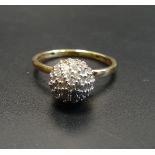 DIAMOND CLUSTER RING of spherical ball design set with pave set diamonds, on nine carat gold